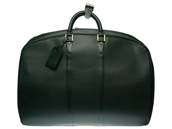 Charming Louis Vuitton Helanga travel bag in green taiga leather