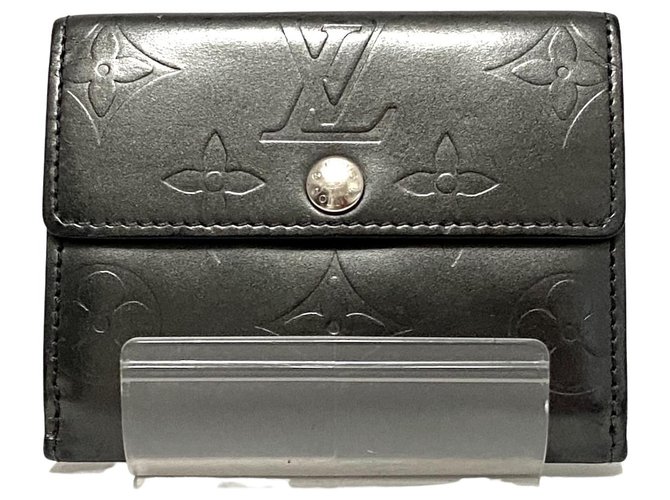 Louis Vuitton Porte-monnaie et porte- carte Veau façon poulain Noir  ref.308913