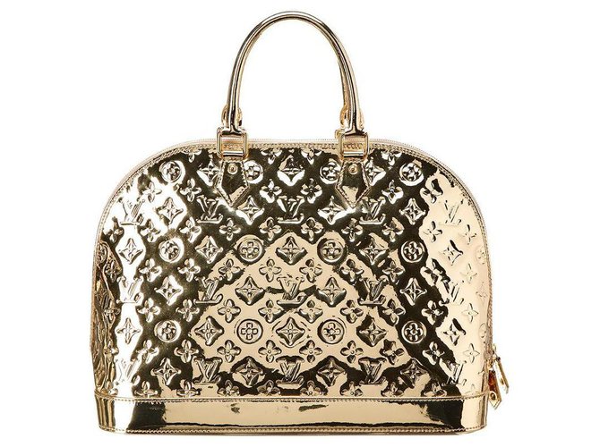 A Louis Vuitton Limited Edition Gold Monogram Miroir Alma GM Bag