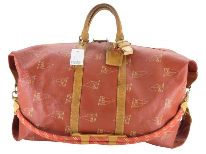 Louis Vuitton 1995 LV Cup Red Sac Marin Keepall Bandouliere Duffle Strap Bag  Leather Rope ref.310670 - Joli Closet