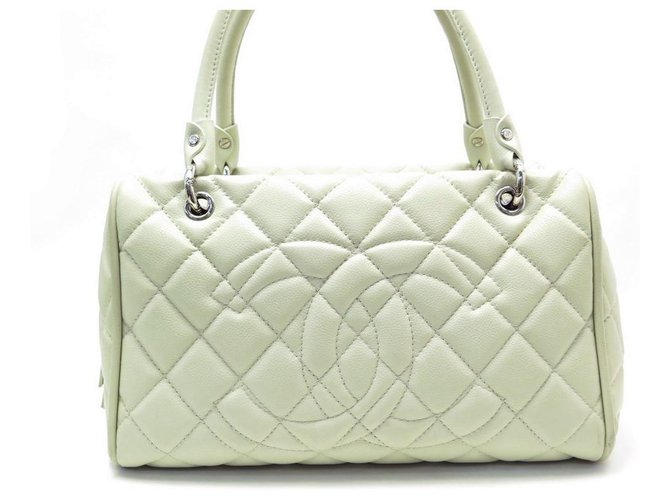 CHANEL BOWLING HANDBAG IN CAVIAR QUILTED CREAM LEATHER HAND BAG