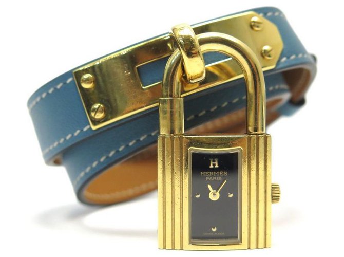 Hermès watch kelly 20 MM QUARTZ lined TOUR BARENIA LEATHER BACKGROUND BLUE WATCH Golden Gold-plated  ref.311340