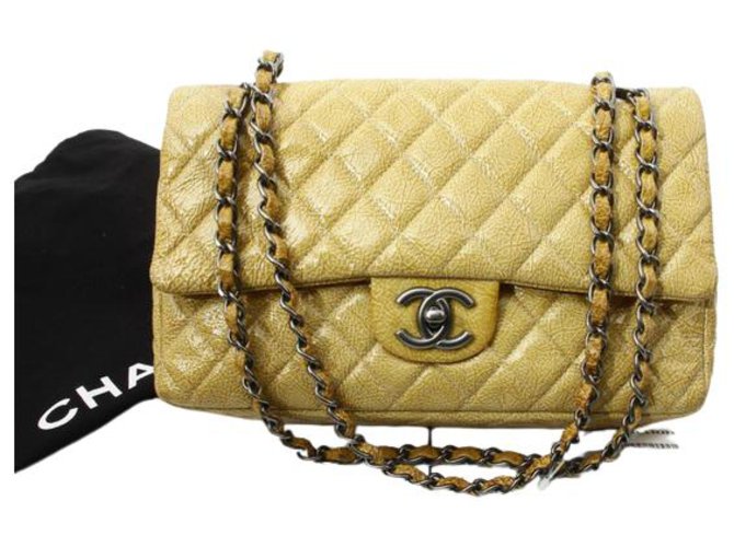 Timeless Chanel intemporal Amarelo Couro  ref.312455