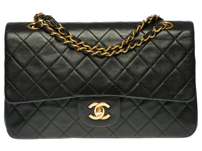 Splendid Chanel Timeless Medium Bag 25cm with lined flap in black quilted leather, garniture en métal doré  ref.313618