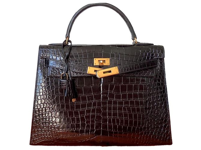 Hermès Kelly32 Nero Pelli esotiche