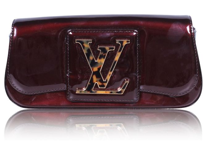 Louis Vuitton Clutch de charol Sobe burdeos Roja