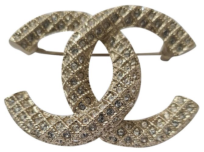 Chanel foderato C D'oro Metallo