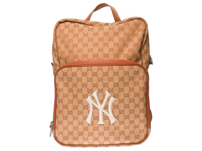 beige gucci backpack