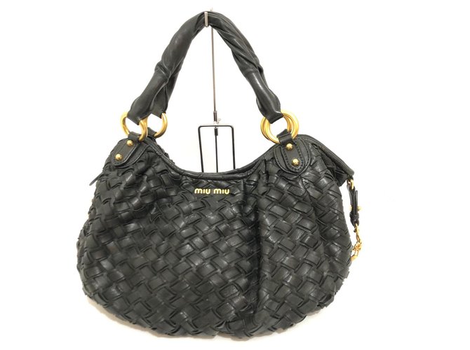 prada miu miu bolsas