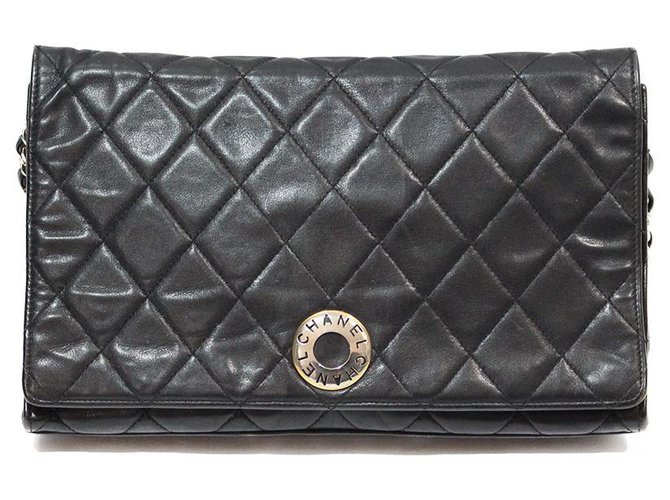 CLASSIC CHANEL BAG WITH FLAP CLASP CHANEL PERFORATED INSCRIPTION Black Leather  ref.320174