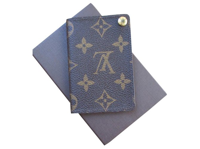 Louis Vuitton Monogram canvas business card holder. Brown Cloth