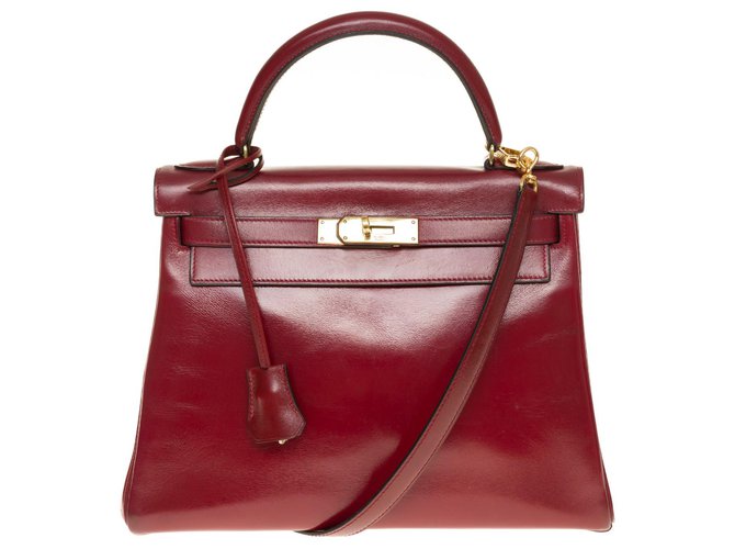 Hermès : Espléndido bolso Hermes Kelly 28 Al revés en cuero box rojo H (Burdeos), adornos de metal chapado en oro  ref.323182