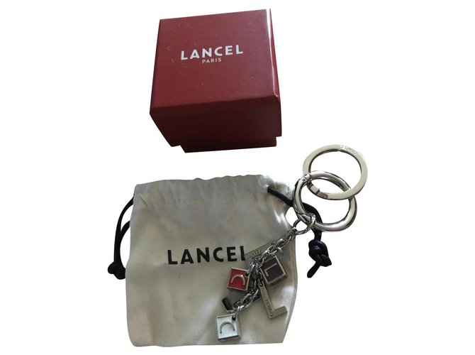 porte clefs Lancel Acier Argenté Blanc Rouge Violet foncé  ref.323449