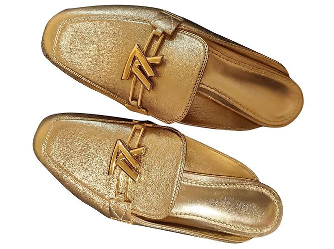 Autre Marque Sandali Louis Vuitton mules in pelle oro D'oro