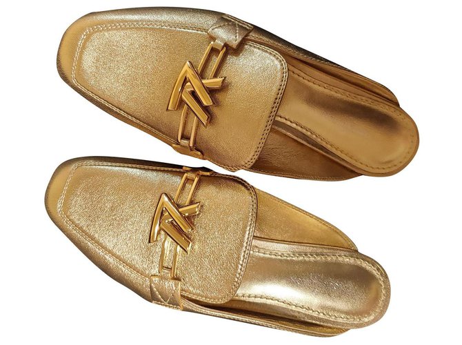 Autre Marque Sandálias de couro ouro Louis Vuitton Mules Dourado  ref.323487