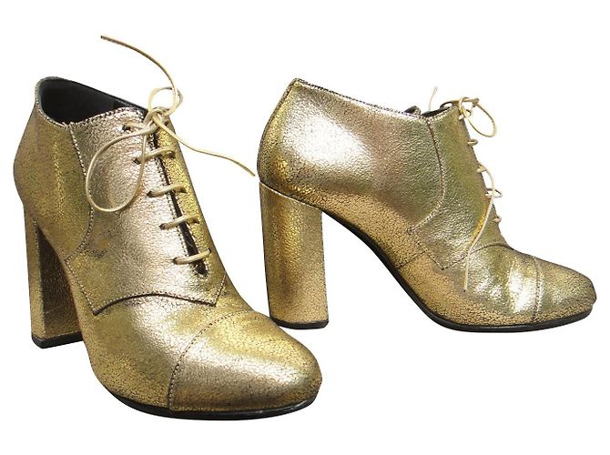 Bottines Max Mara en cuir doré taille 39