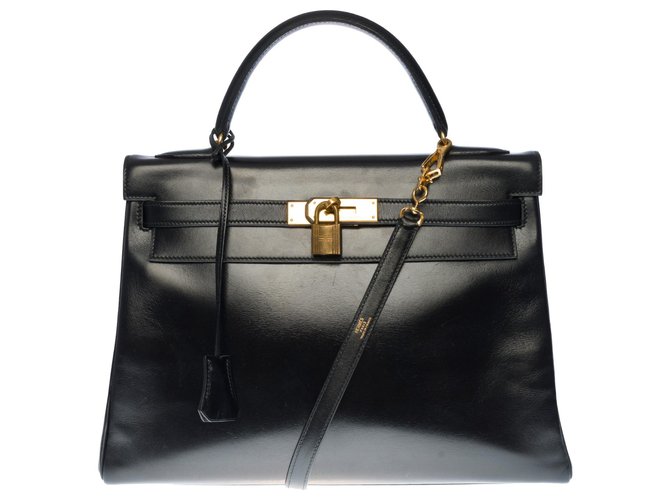 Hermès Splendid Hermes Kelly handbag 32 returned shoulder strap in black box leather, gold plated metal trim  ref.330343