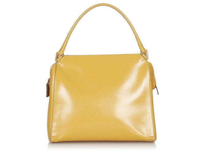 Mustard color store leather handbags