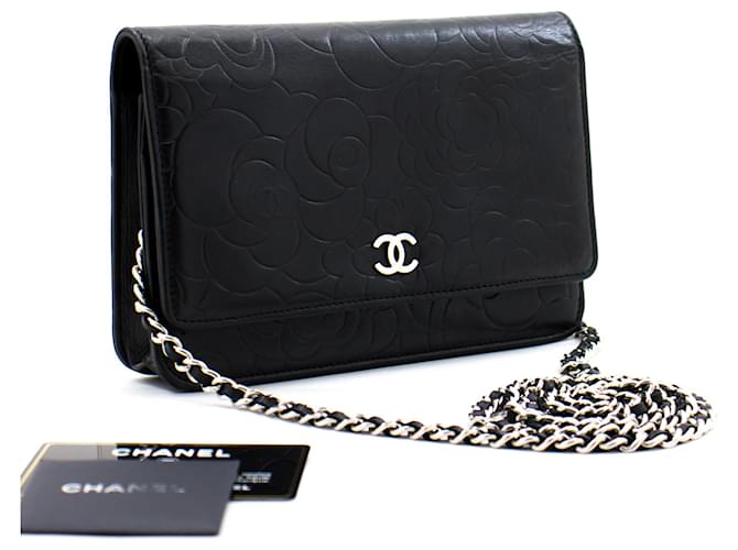 CHANEL Black Camellia Embossed Wallet On Chain WOC Umhängetasche Schwarz Leder  ref.336517