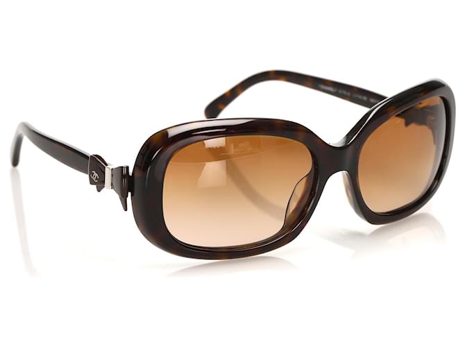 Chanel Brown runde getönte Sonnenbrille Braun Kunststoff  ref.338007