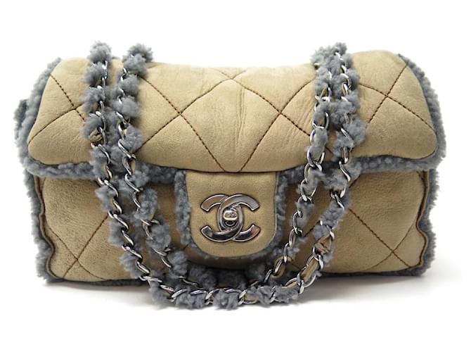 NEW CHANEL TIMELESS HANDBAG IN SHEARLING BANDOULIERE SHEARLING BAG Brown Leather  ref.340911