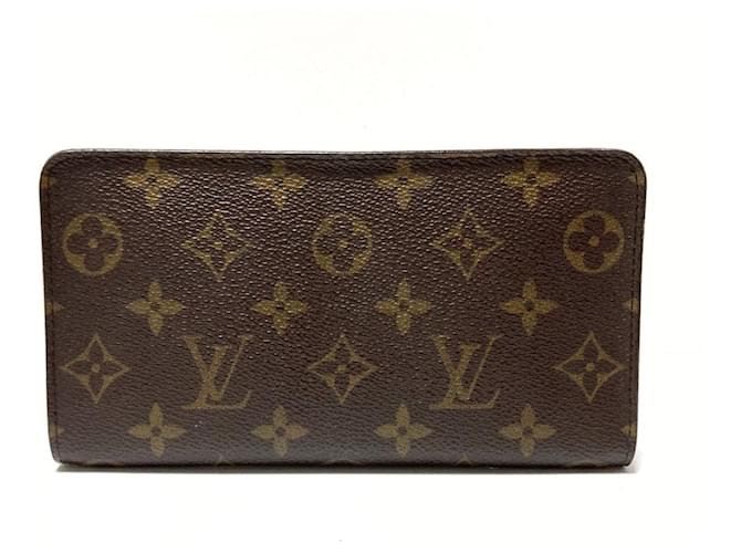Louis Vuitton Porte monnaie Zippy Brown Cloth  ref.341281