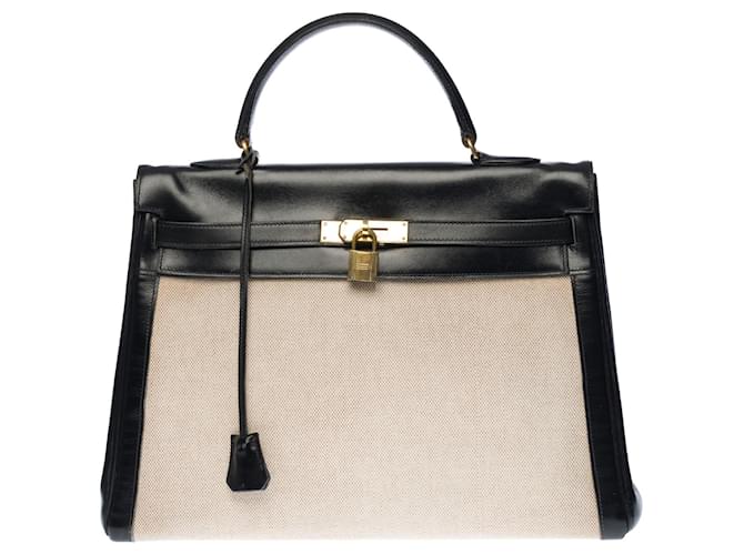 Hermès Stupenda borsa Hermes Kelly 35 cm rovesciato in pelle box nera e tela beige, garniture en métal doré  ref.341489