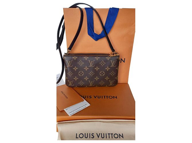 Louis Vuitton Pochette con zip foderata con monogramma Caramello Tela