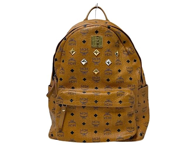 yellow mcm backpack