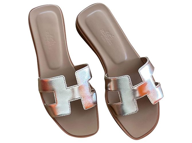 Hermès Oran Sandalen Beige Golden Bronze