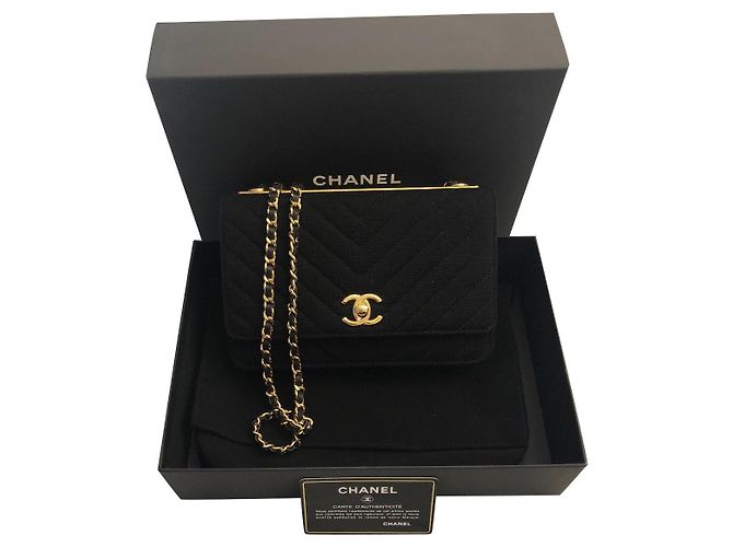 Bolsa de mão Chanel em tecido preto