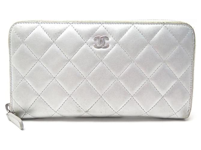 Timeless LONG CHANEL CLASSIC ZIPPED WALLET IN SILVER QUILTED