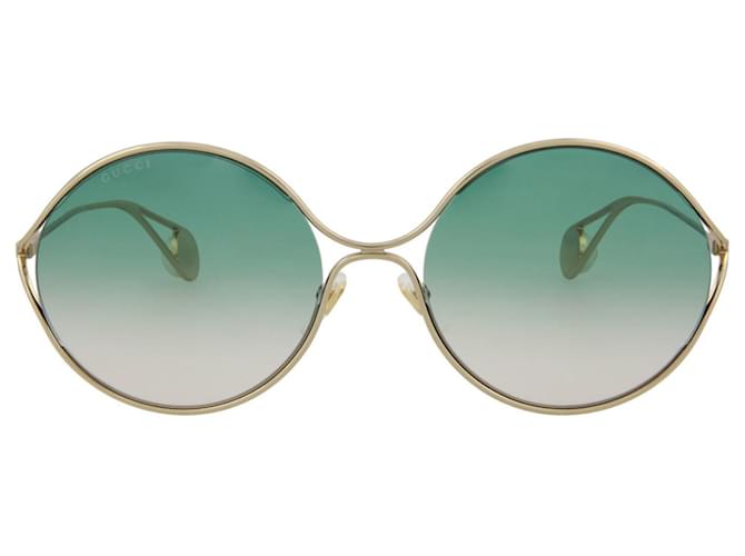 Gucci Óculos de sol ovais de metal Dourado Metálico  ref.377970