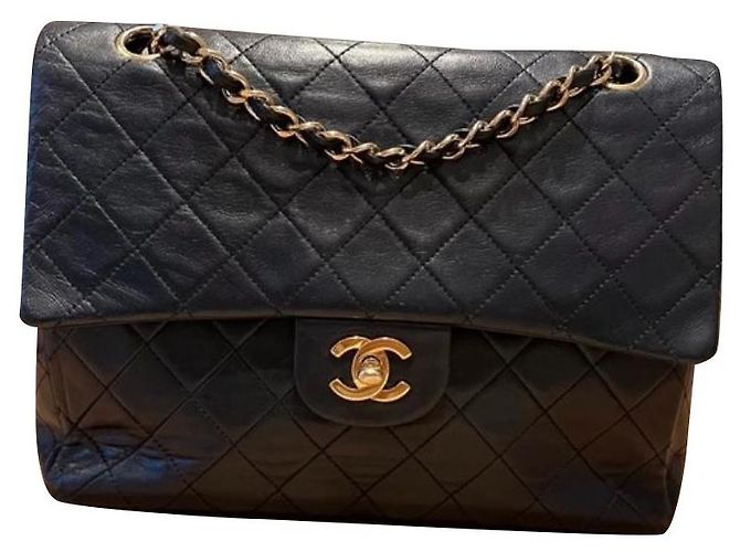 Bolsa de mão Chanel Timeless em couro azul marinho e dourado Gold hardware