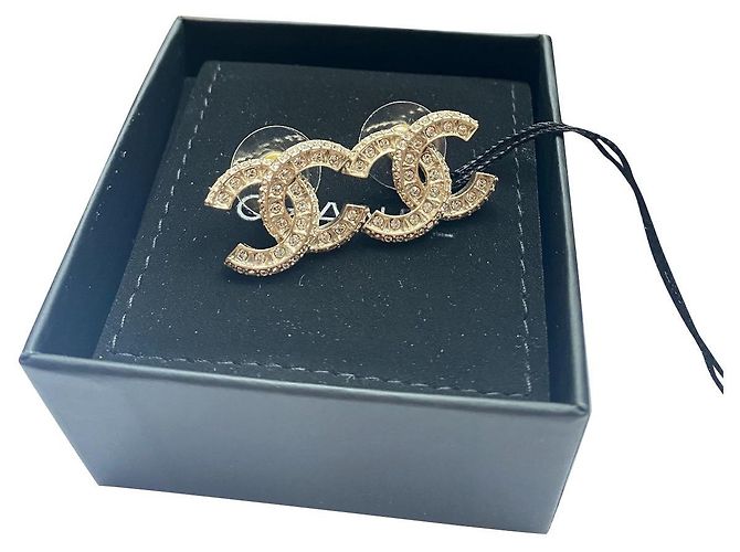 Orecchini con cristalli logo Chanel CC color oro Gold hardware