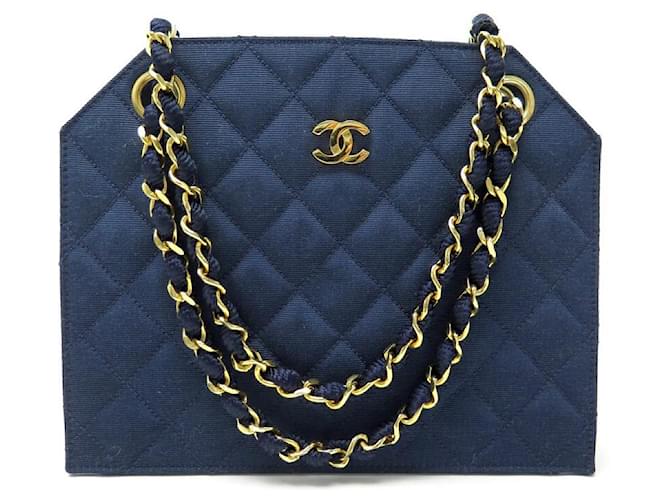 VINTAGE CHANEL HANDBAG 1986 IN QUILTED FABRIC GOLD CHAIN BANDOULIERE PURSE  Blue Cloth ref.383360 - Joli Closet
