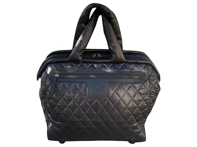 Valise Chanel Coco Cocoon noire Toile  ref.385680