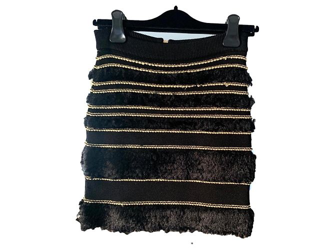 Gonna Balmain in tweed nero con cuciture dorate