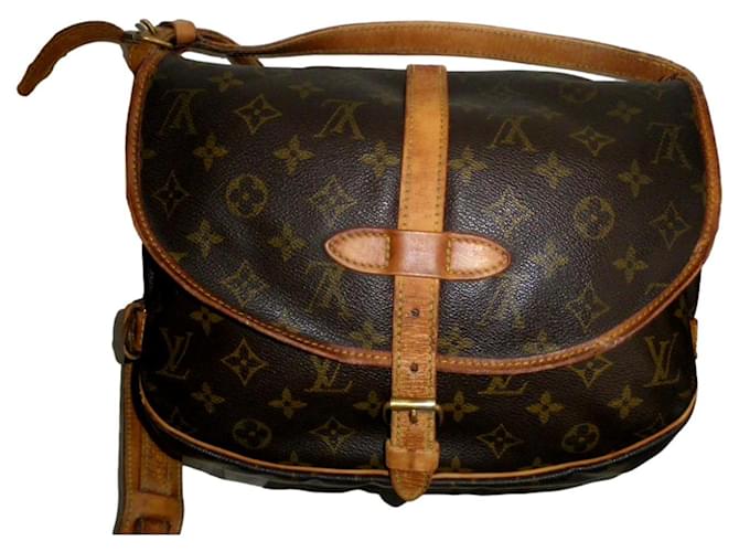 Saumur Louis Vuitton Handbags Brown Leather Cloth  ref.390174