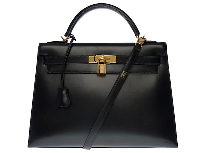 Hermès Kelly excepcional 32 sela com alça de ombro em couro preto , guarnição de metal banhado a ouro  ref.389658