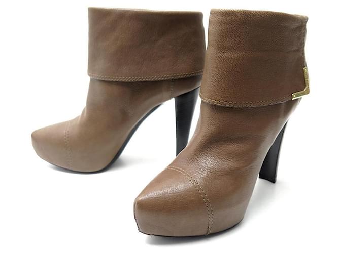 LOUIS VUITTON SHOES QUEEN ANKLE BOOTS 39 LOW BOOTS BROWN LEATHER HEELS  ref.392261 - Joli Closet