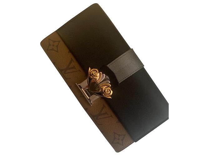 Louis Vuitton Brown Monogram Reverse Sarah Column Cartera larga negro
