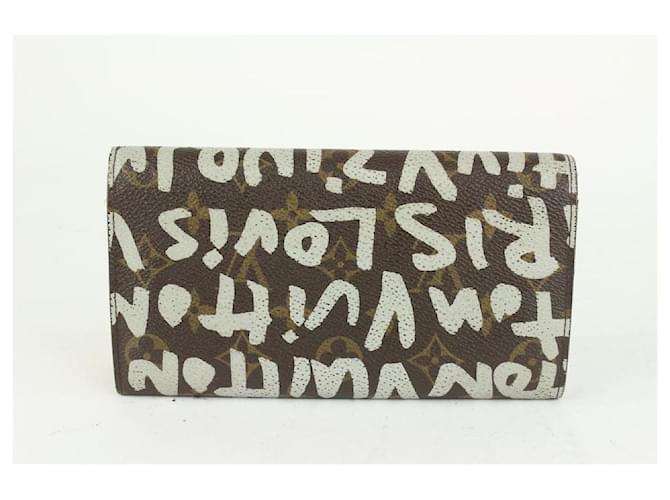 Louis vuitton Monogram leopard sarah wallet with date code