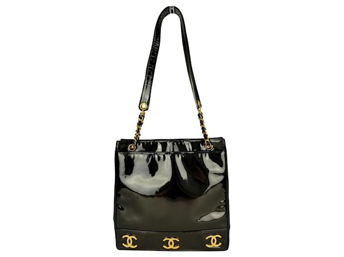 “Chanel” bag in black patent leather
