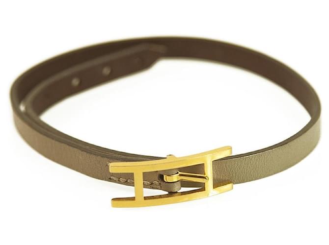 Hermès Bracelet en cuir étoupe doublé Hermes Hapi avec quincaillerie dorée Grand Taupe  ref.395804