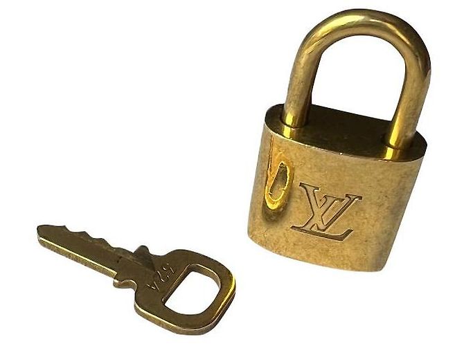 Ciondolo per borsa Louis Vuitton Lucchetto Oro Metallo D'oro
