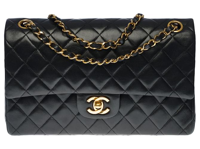 Splendid Chanel Timeless Medium Bag 25cm with lined flap in black quilted leather, garniture en métal doré  ref.398435
