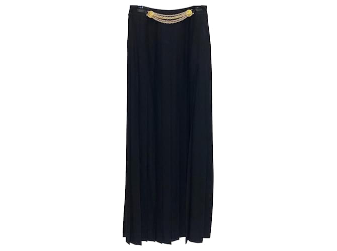Falda larga Céline vintage en crepé plisado negro con detalle de cadena en tono dorado Poliéster  ref.399303