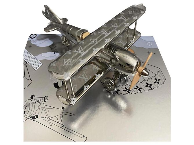 Aereo Louis Vuitton in metallo cromato Argento