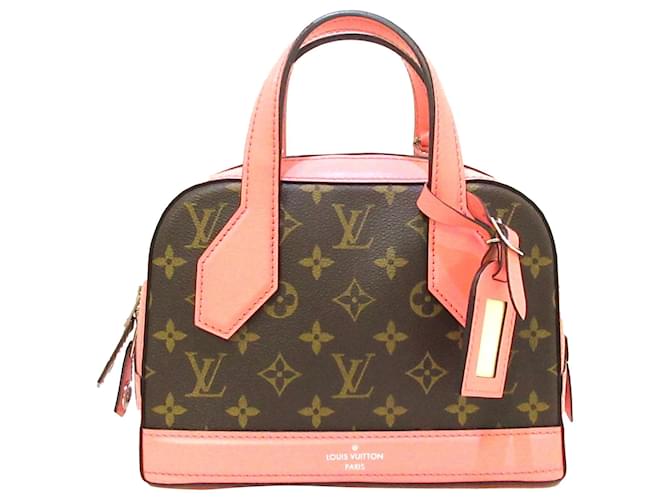 Louis Vuitton Dora Leather Handbag